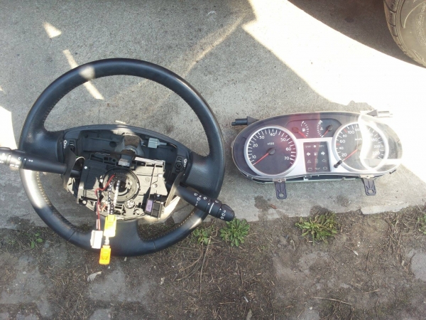 improvements: leather steering wheel<br />
 + some good looking gages :)